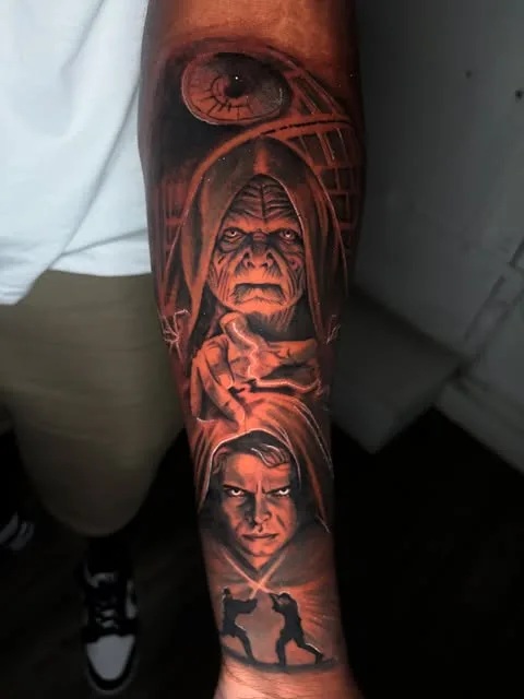 A black and grey portrait sleeve with a hooded figure.
